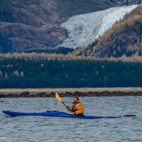 Michael paddles past the Davison Glacier